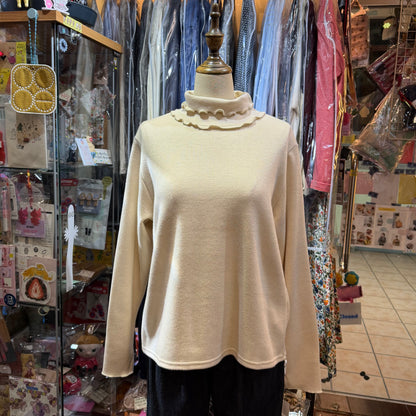 Ista-ire Ivory Turtleneck Top