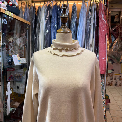 Ista-ire Ivory Turtleneck Top