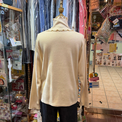 Ista-ire Ivory Turtleneck Top