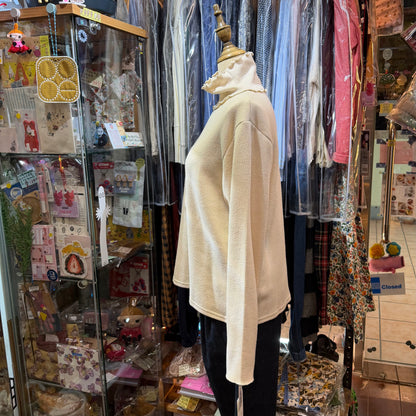 Ista-ire Ivory Turtleneck Top